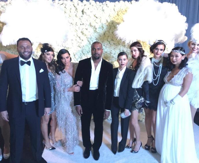 What's that we see? Another flower wall at Kris Jenner's 60th <em>'The Great Gatsby'</em>-themed party? That Kanye did himself attend? Curious INDEED.