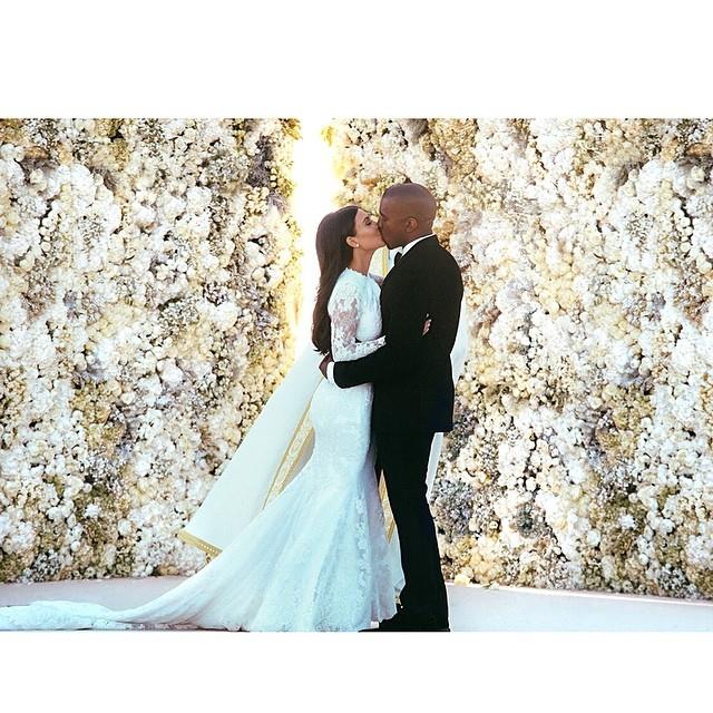 A flower wall at Kanye's own wedding to Kim? A coincidence? We think not.