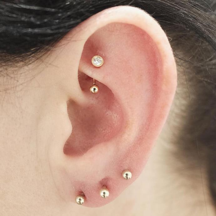 **ROOK PIERCING**<br><br>

[Rook piercings](https://www.elle.com.au/beauty/rook-piercing-20334|target="_blank") go through the cartilage on the ridge between the inner and outer conch.<br><br>

**Healing time:** 6 to 10 months.<br><br>

*Image via [@bentauber](https://www.instagram.com/p/BMqkL1FhpVD/|target="_blank"|rel="nofollow")*