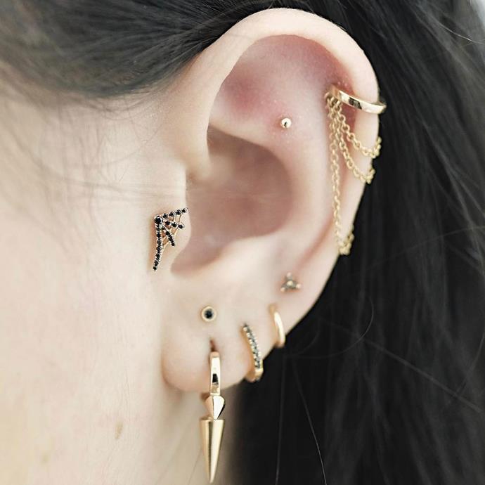 **And now for some pretty combinations...**<br><br>

There's a lot going on in this ear, but it all works together beautifully. There's a (diamond spider web) tragus, a flat, multiple helix piercings and a lot of lobe action, too.<br><br>

*Image via [@bentauber](https://www.instagram.com/p/BQAjI9Ch_ap/|target="_blank"|rel="nofollow")*