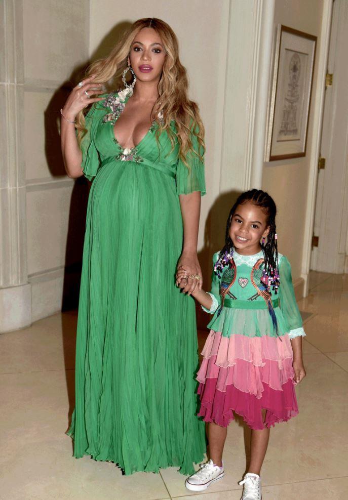 Last night Beyoncé and Blue Ivy engaged in their favourite pasttime: wearing Gucci and attending fancy things together, namely the <a href="http://www.beyonce.com/">Beauty and the Beast premiere</a>. Bey wore a emerald green chiffon dress, whilst Blue—in the tiniest and most casual way possible—wore a modified version of this <a href="https://www.net-a-porter.com/us/en/product/757433/Gucci/velvet-trimmed-embellished-tiered-silk-chiffon-gown?cm_mmc=LinkshareUK-_-TnL5HPStwNw-_-LinkshareUS-_-TnL5HPStwNw-_-Custom-_-LinkBuilder&siteID=TnL5HPStwNw-uO0RVbQz5UtPqhrjznvVcw&Skimlinks.com=Skimlinks.com&siteID=TnL5HPStwNw-12j4cv9Dwyxp8QoiNjt6QA&Skimlinks.com=Skimlinks.com">velvet-trimmed embellished tiered silk-chiffon gown</a> which retails, in adult-form, for a little over $34,000.
