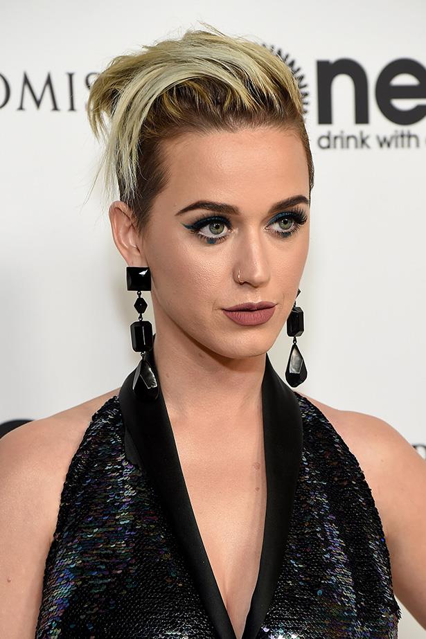 Katy Perry's turquoise eye design mimicked the petrol sequins of her halterneck at Elton John's 70th Birthday last month.