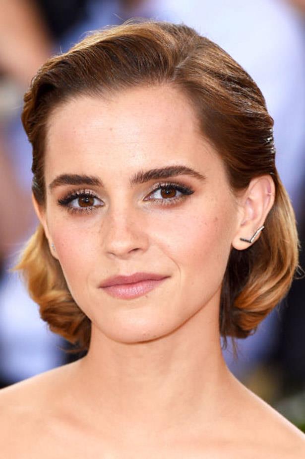 <strong>Emma Watson</strong> <br><br> Side parted, slicked back <em>and</em> curled under, Emma Watson's bob is a sculptural feat.