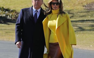 Watch Melania Trump Use Her Fabulous Coat To Swerve Holding Donald Trump's Tiny Hand