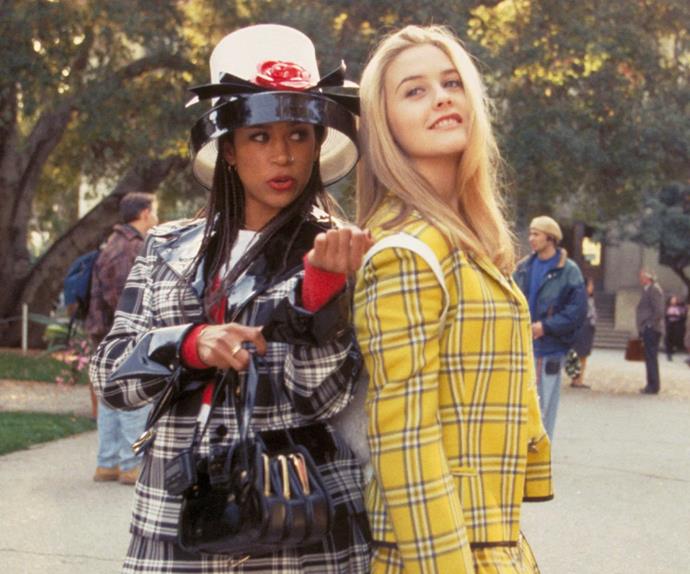 Alivia Silverstone wearing a yellow plaid suit in Clueless