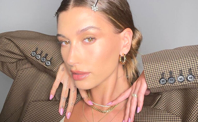 Hailey Bieber Revealed The Secret To Her Perfectly Pearlescent Manicures