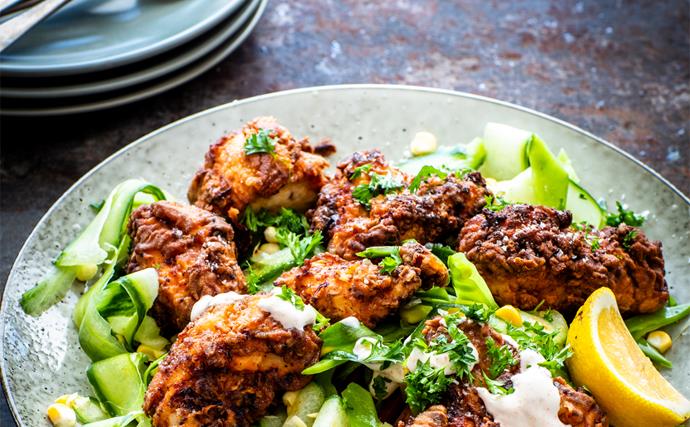 Crispy fried chicken with cucumber and corn salad