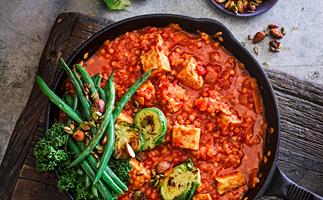 Tempeh and red lentil curry with roasted greens