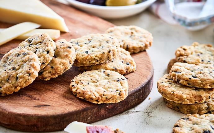 Olive and rosemary cheese biscuits on chopping board