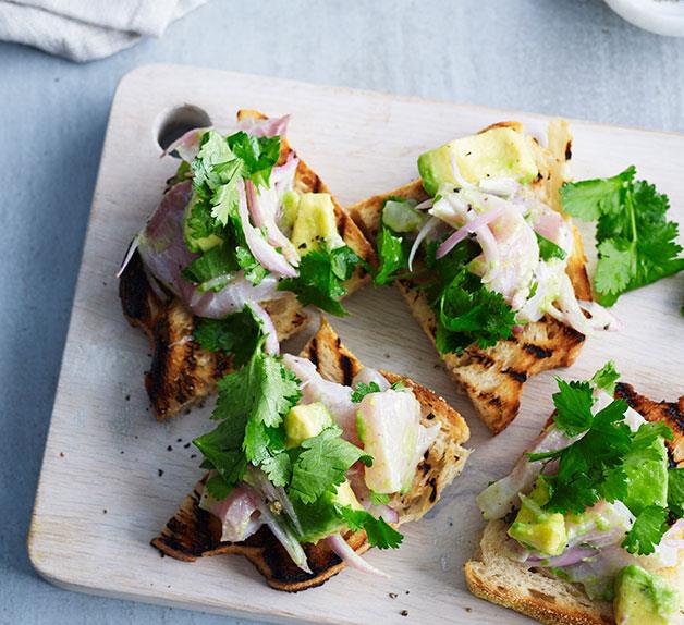 Ceviche toasts with avocado and coriander