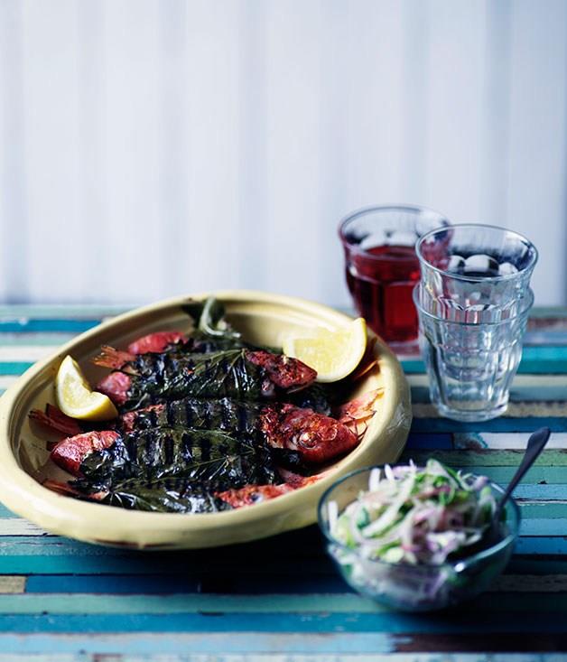 **Barbecued barbounia in vine leaves with onion salad**
