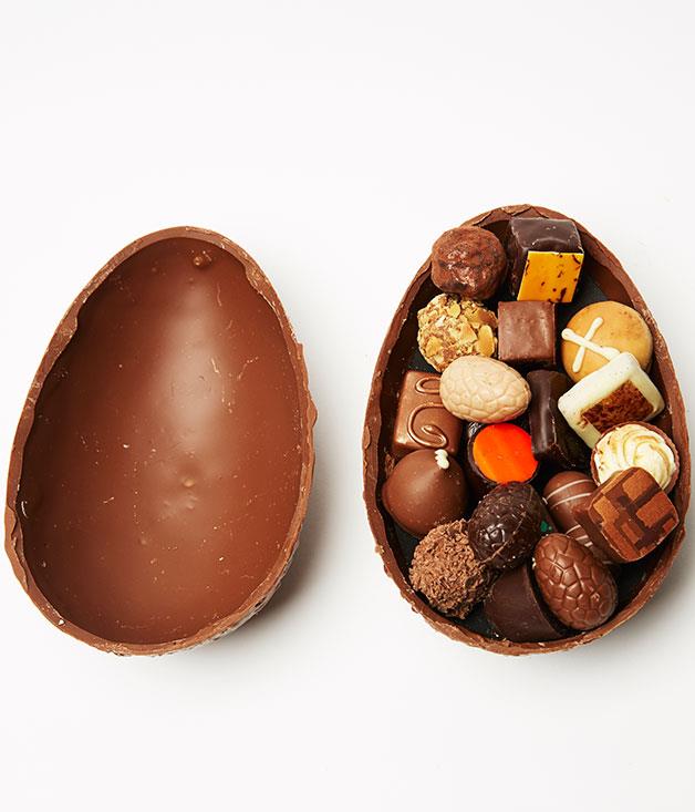 **Chocolate-Filled Egg**
Crack open this handcrafted, head-sized milk chocolate egg and you'll find 20 bite-sized chocolates inside. A treasure chest for true chocoholics. _Milk chocolate egg with 20 assorted chocolates, $76.50, [bellefleur.com.au](http://www.bellefleur.com.au "Belle Fleur")_