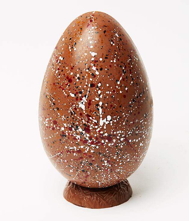 **Hand-Painted Galaxy Egg**
This Jackson Pollock-inspired chocolate egg, filled with roasted nuts and candied fruit, is almost too beautiful to eat. Almost… _Milk chocolate egg, $36, [kakawachocolates.com.au](http://www.kakawachocolates.com.au "Kakawa")_