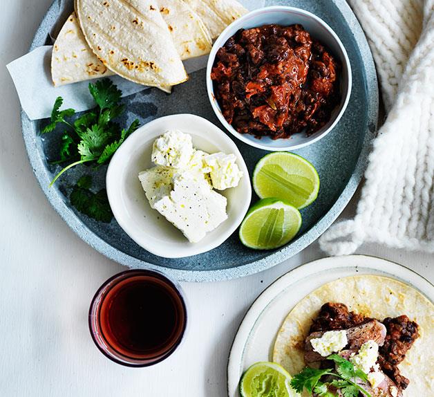 Soft tacos with black bean mole and flank steak
