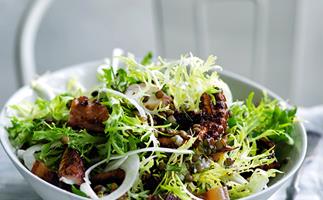 Octopus, frisée and fennel salad with lardons and lentil dressing