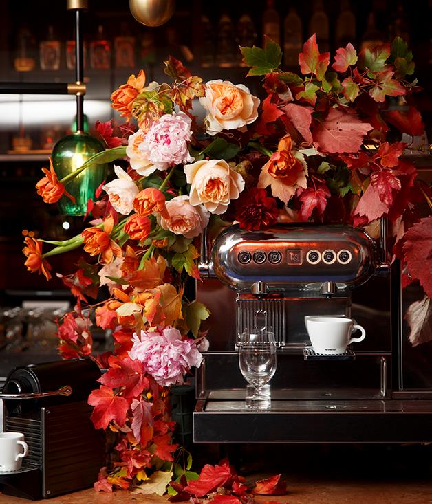 **Autumn colours**
The room was filled with fresh flowers and foliage in autumnal hues, even decorating the vintage coffee machines from Nespresso.

Photograph by Marcel Aucar.