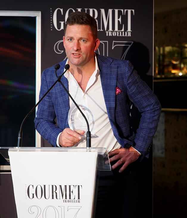 **QT Melbourne wins two awards**
Troy Cuthbertson, general manager, QT Melbourne accepts the award for Large Hotel of the Year. The latest in QT's stable of hotels in Australia and New Zealand, QT Melbourne also won the award for Best Bar.

Photograph by Marcel Aucar.