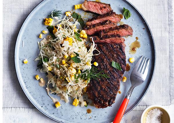 Smoky sirloin steaks with corn and cabbage slaw