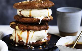 Warm peanut butter cookie ice-cream sandwiches with burnt honey