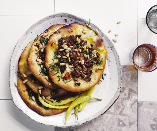 Turkish-style bread topped with lamb, spices and pine nuts