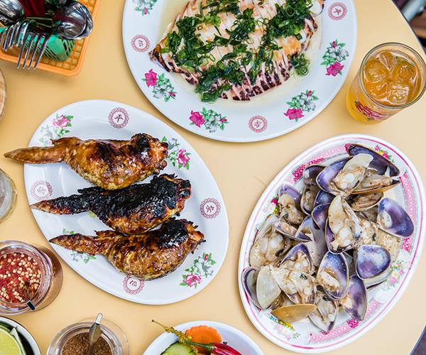 Dishes at Kingdom of Rice include pippies, stuffed chicken wings and grilled calamari
