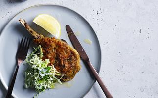 Veal cotoletta with cabbage, mint, apple and dill