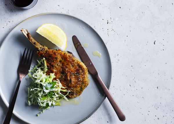 Veal cotoletta with cabbage, mint, apple and dill