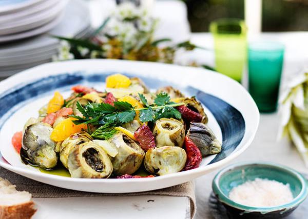 Baked artichokes with citrus and herb salad
