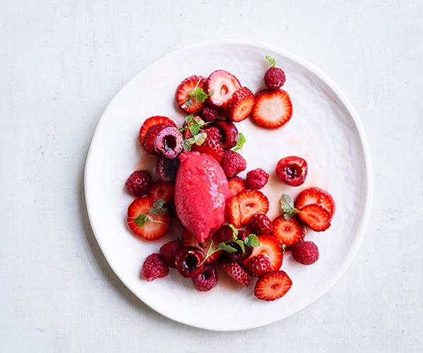 Strawberry, cherry and raspberry salad with raspberry sorbet