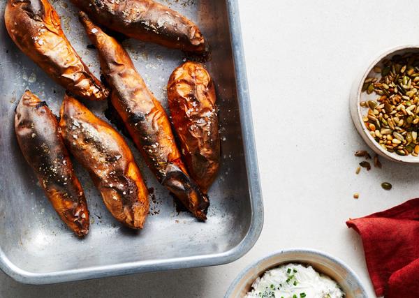 Baked sweet potatoes with goat's cheese topping