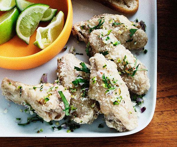 Fried chicken wings with coriander and green chilli