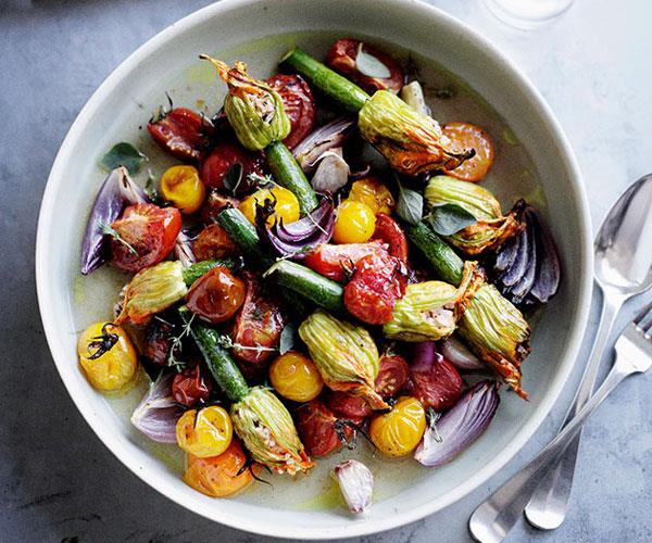 **[Roast stuffed zucchini flowers with tomato and oregano](https://www.gourmettraveller.com.au/recipes/browse-all/roast-stuffed-zucchini-flowers-with-tomato-and-oregano-11097|target="_blank")**
