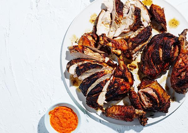 Brined barbecued turkey with spices and a piri piri sauce