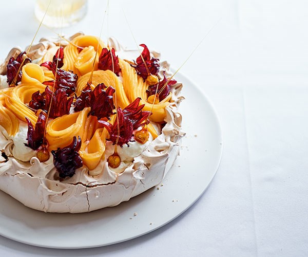 **[Lauren Eldridge's brown-sugar pavlova with mango, hibiscus, hazelnut and coconut cream](https://www.gourmettraveller.com.au/recipes/chefs-recipes/brown-sugar-pavlova-18042|target="_blank"|rel="nofollow")**