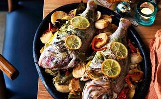 Marinated whole snapper baked on potatoes and peppers (Dorada al fondo con patatas)