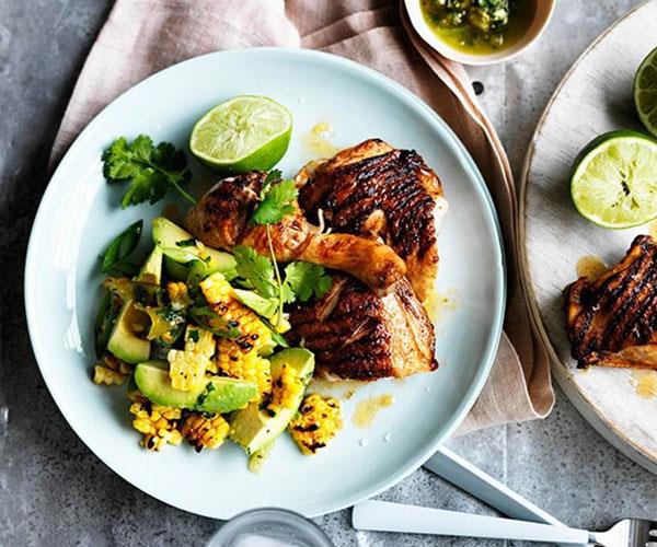 Barbecued spiced chicken with corn, avocado and lime