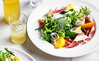 Herb salad with peaches and prosciutto