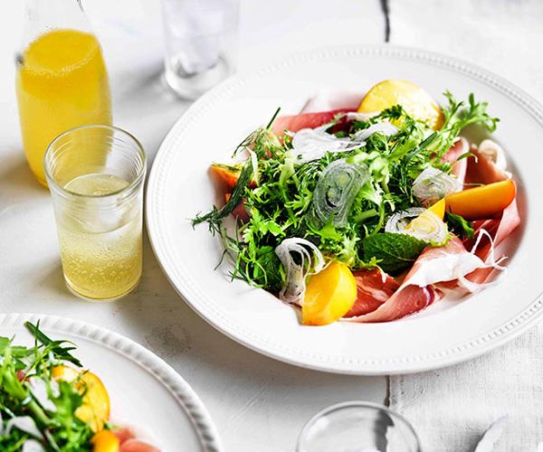 Herb salad with peaches and prosciutto