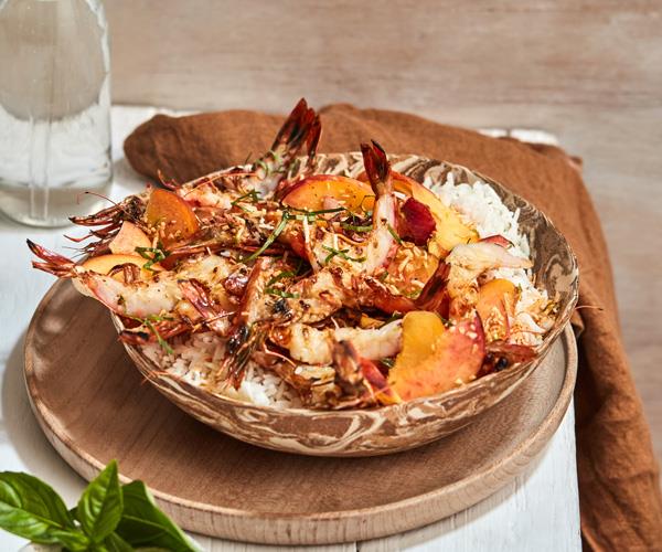 **[Grilled prawns with coconut rice and peach sambal](https://www.gourmettraveller.com.au/recipes/fast-recipes/prawns-coconut-rice-18316|target="_blank")**