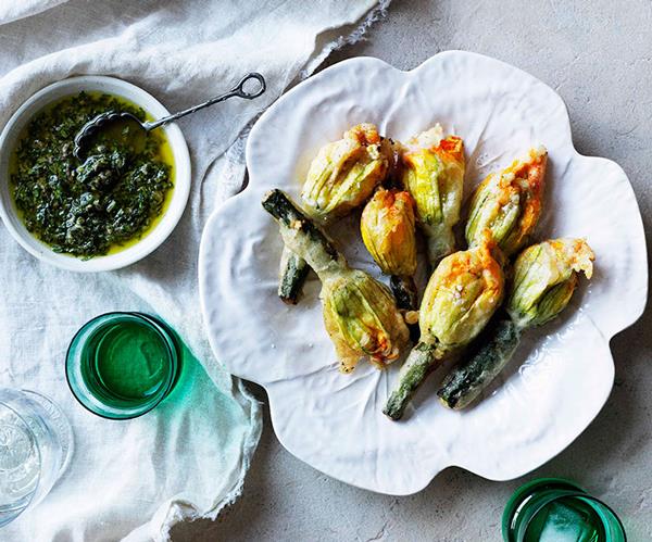 Zucchini flowers with ricotta, parmesan, and mint and anchovy sauce
