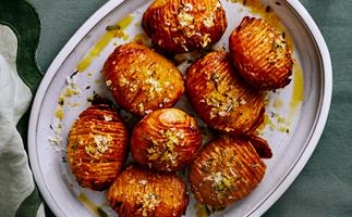 Duck-fat hasselback potatoes with rosemary salt