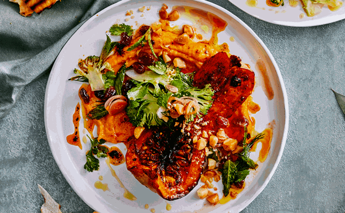 Caramelised pumpkin topped with broccoli fatteh and macadamias