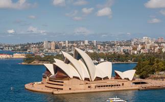 Photo of Sydney Opera House and Sydney Habour with a ferry sailing past the Opera House