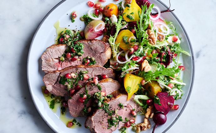 Sliced cooked lamb, beetroot and walnut with herb dressing