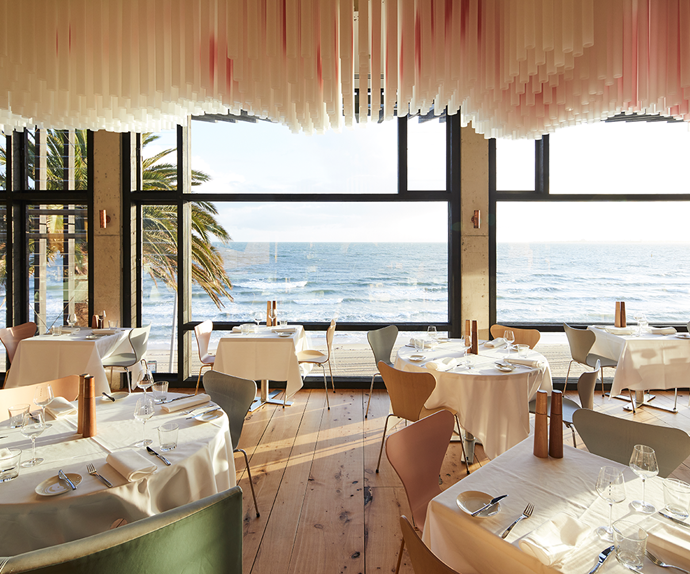 Pastel green and pink interiors overlooking St Kilda beach at Stokehouse, Melbourne.