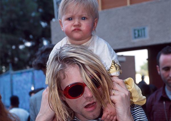 Frances Bean Cobain with her dad Kurt Cobain.