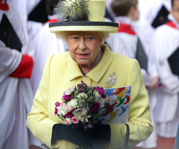 The Queen, with a jaunty feather in her hat, looked as sprightly as ever in a lemon-coloured ensemble.