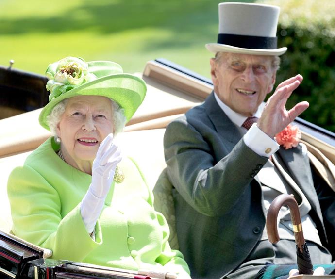 The Queen, dressed in a vivid shade of lime green, was accompanied by Prince Philip.