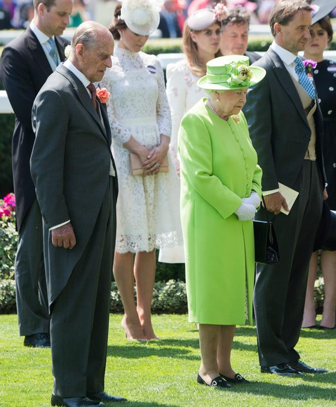 The Queen and other royal attendees bowed their heads for the solemn moment of remembrance.
