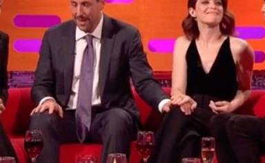 Claire Foy subtly puts Adam Sandler in his place after he repeatedly touches her on TV